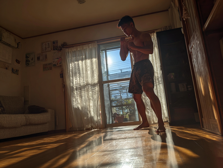 u2933761673_A_Japanese_man_doing_shadow_boxing_at_home_ - ar_4_5d6f6faa-5203-4be5-9142-1a433647e94f_3.png
